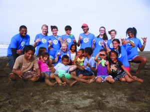 Costa Rica teen sea turtle campers performing community service.